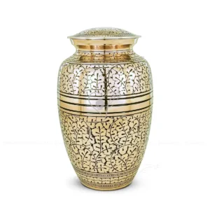 Aurelian Leaf 10-inch solid brass cremation urn featuring hand-etched foliage patterns and polished gold finish with smooth bands.