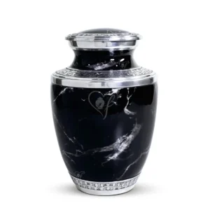 Midnight Onyx 10-inch Treisty shape aluminum cremation urn featuring a High-Gloss Graphic Wrap of black marble and hand-engraved silver floral bands.