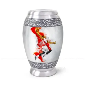 Slam Dunk 10-inch aluminum cremation urn featuring a High-Gloss Graphic Wrap of a basketball player with red paint splatters and hand-engraved silver floral bands.