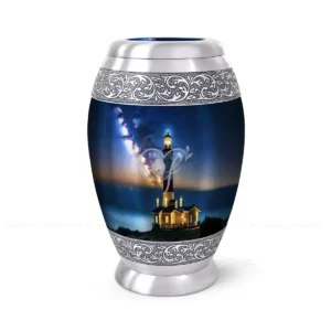 Eternal Beacon 10-inch aluminum cremation urn featuring a High-Gloss Graphic Wrap of a lighthouse under the Milky Way with hand-engraved silver floral bands.