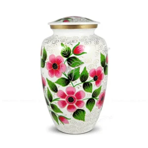 Morning Meadow 10-inch classic aluminum cremation urn featuring a hand-painted pink floral and green leaf design on a white background.