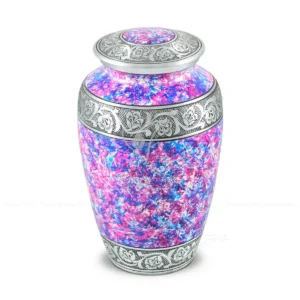 Cosmic Orchid 10-inch classic aluminum cremation urn featuring a multi-tonal purple and pink marbled finish with silver hand-chiselled floral engravings.