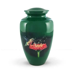 Zinnia Grace 10-inch aluminum cremation urn featuring a high-gloss emerald green graphic wrap with a hummingbird and a red zinnia blossom.
