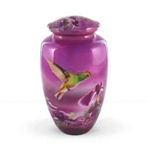 Amethyst Flight 10-inch aluminum cremation urn featuring a high-gloss amethyst purple graphic wrap with a hummingbird and purple irises.