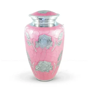 Blush Bloom 10-inch classic aluminum cremation urn featuring a hand-applied pink glossy meena finish and hand-engraved shiny aluminum rose design.