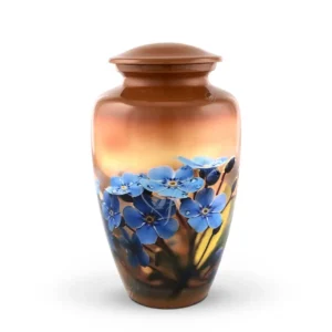 Eternal Remembrance 10-inch classic aluminum cremation urn featuring a sunset bronze finish and a vibrant blue Forget-Me-Not floral wrap.
