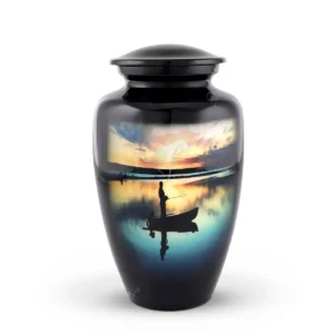 Golden Reflection 10-inch classic aluminum cremation urn featuring a High-Gloss Graphic Wrap of a fisherman in a boat at sunset and a black painted glossy lid.