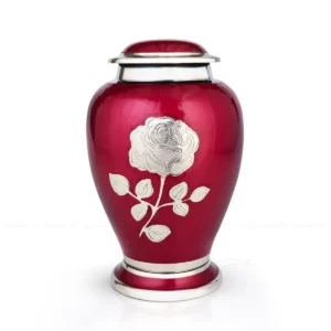 Eternal Rose classic red rose brass urn in Crimson Red with a hand-engraved nickel rose.