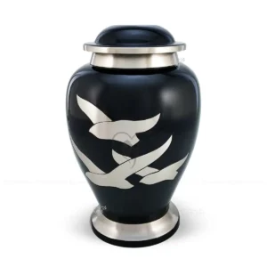 Eternal Flight oversized aluminum companion cremation urn in Glossy Black with brushed aluminum bird motifs.