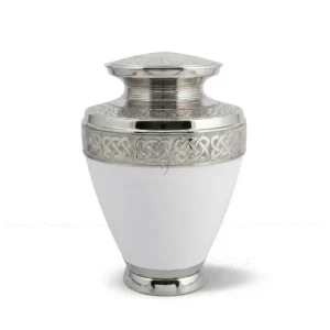 Celtic Pearl 10-inch solid brass adult cremation urn in glossy white meena with hand-engraved silver Celtic knot bands.