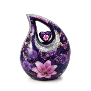 Fiora Amethyst Garden 10-inch aluminum cremation urn with a vibrant purple floral graphic wrap, polished silver accents, and a central matching heart.